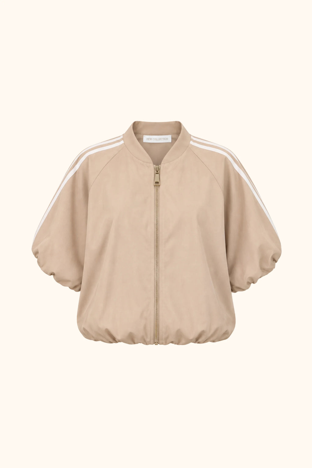 A beige zip-up jacket with a stand collar, voluminous balloon sleeves, and white double stripes running along the shoulders, shown against a plain white background.